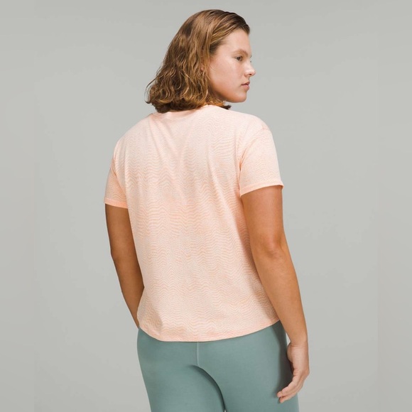 Lululemon Train to Be Short Sleeve Shirt in Ripple Wave White / Highlight Orange - Picture 2 of 9